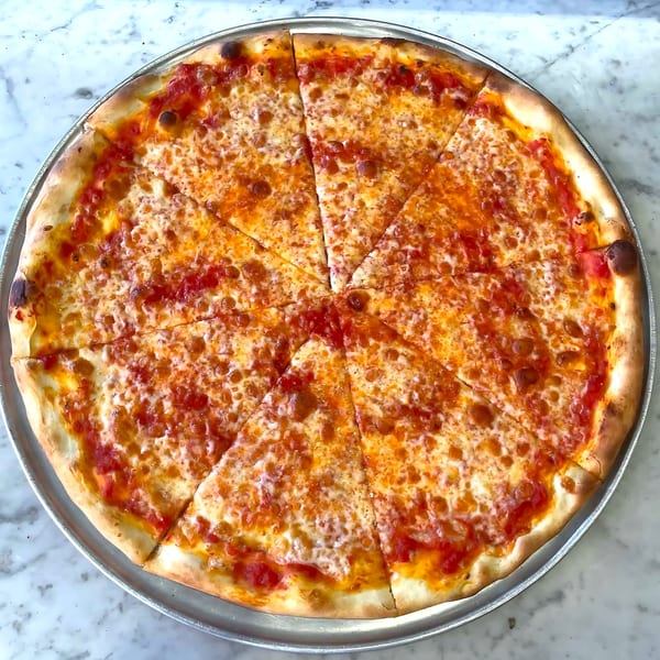 A whole Joe's Pizza cheese pizza, cut into eight slices, on a metal tray.